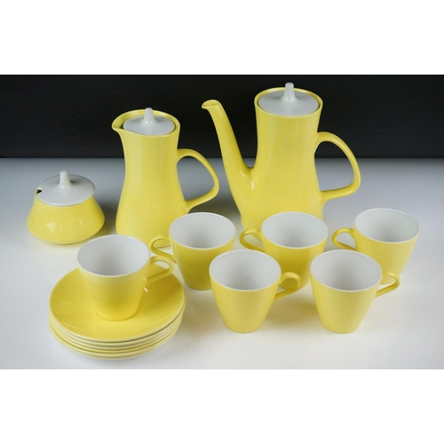 76 - Poole Pottery bright yellow coffee service to include a coffee pot & cover, hot water jug, 6 tall co... 