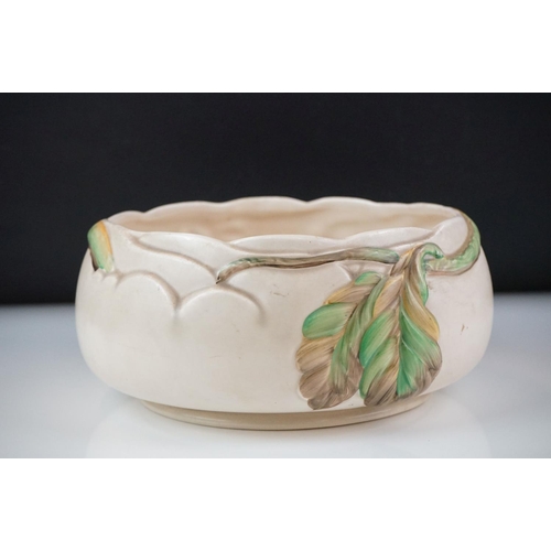 78 - Two Clarice Cliff Newport Pottery bowls, to include fruit bowl with relief moulded foliate decoratio... 