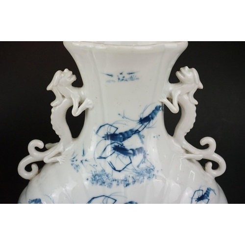 8 - Pair of Chinese Porcelain Moon Flasks, each with two dragon or qilin handles, decorated with shrimps... 