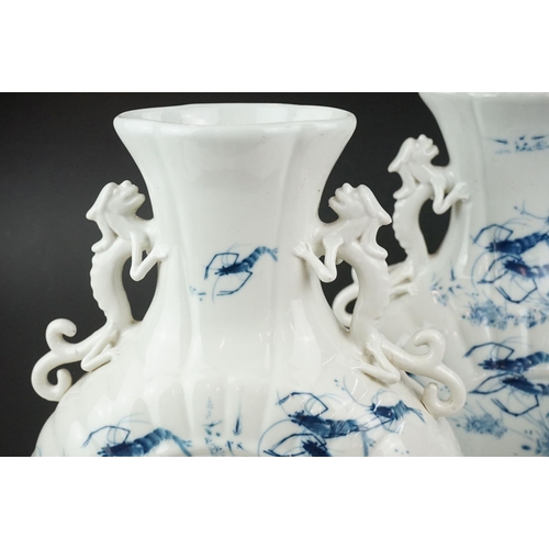 8 - Pair of Chinese Porcelain Moon Flasks, each with two dragon or qilin handles, decorated with shrimps... 