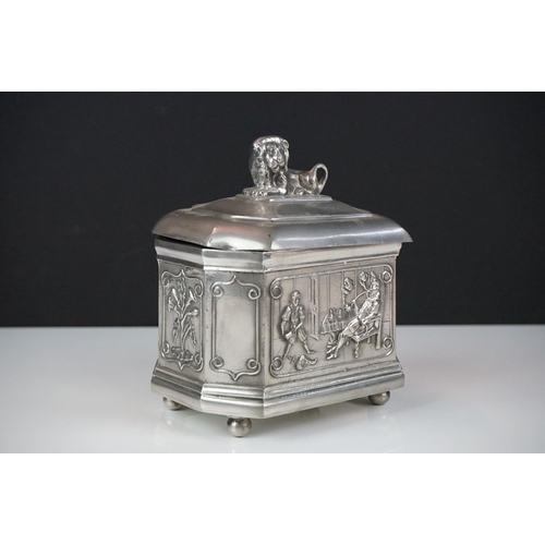 143 - A.E. Williams pewter tea caddy of octagonal form with relief panel decoration depicting a tavern sce... 