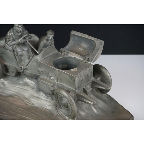 146 - Resin vintage rally car desk stand, the bonnet lifts to reveal space for an inkwell, with indistinct... 