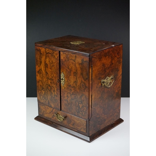 152 - 19th Century burr walnut table top smokers cabinet, with two doors opening to reveal three drawers w... 