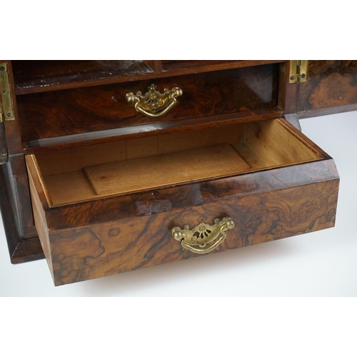 152 - 19th Century burr walnut table top smokers cabinet, with two doors opening to reveal three drawers w... 