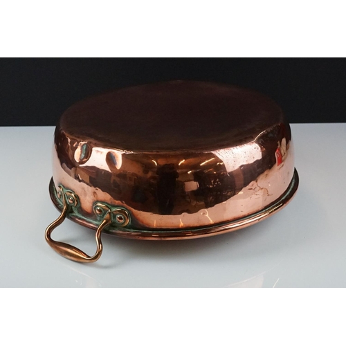 185 - Antique Copper Twin Handled Cooking / Jam Pan, 36cm diameter together with an Antique Copper Skillet... 