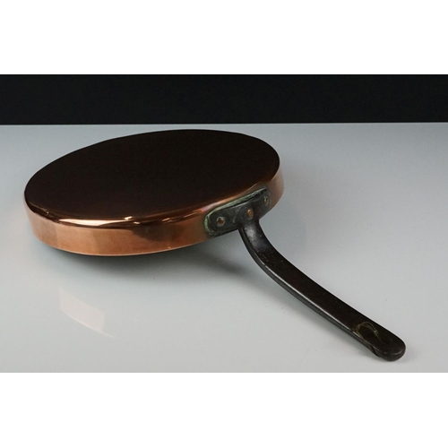 185 - Antique Copper Twin Handled Cooking / Jam Pan, 36cm diameter together with an Antique Copper Skillet... 