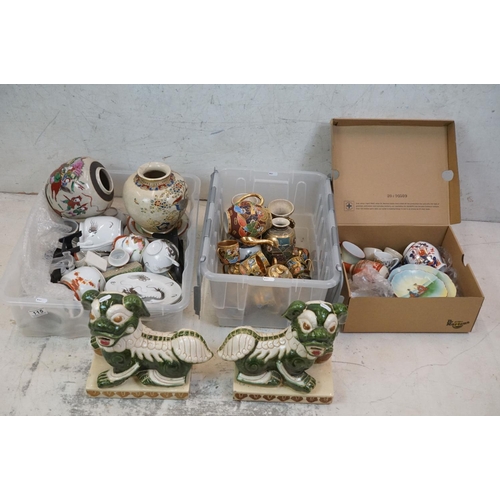 115 - Large collection of Oriental ceramics to include a pair of Chinese pottery foo dogs raised on rectan... 