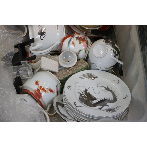 115 - Large collection of Oriental ceramics to include a pair of Chinese pottery foo dogs raised on rectan... 