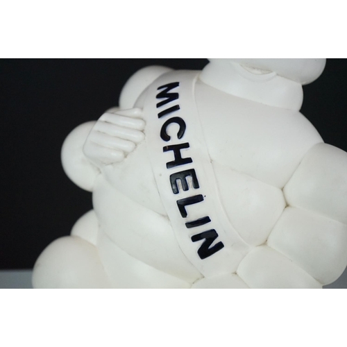 171 - Advertising - Michelin Man plastic figure seated on a metal support, approx 37cm high