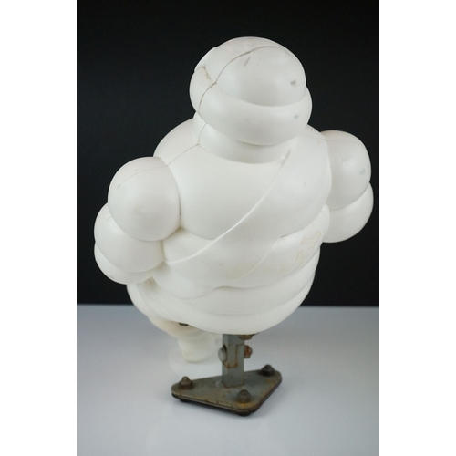 171 - Advertising - Michelin Man plastic figure seated on a metal support, approx 37cm high