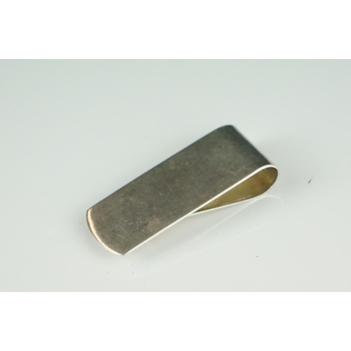 278 - A fully hallmarked sterling silver money clip together with a hallmarked silver Bourbon decanter lab... 