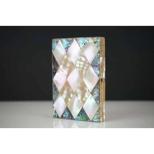 279 - An early 20th century mother of pearl and Paua / Abalone shell decorated card case.