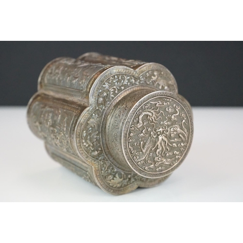 280 - An antique ornate Chinese silver tea caddy with Repoussé decoration, character marks to base.