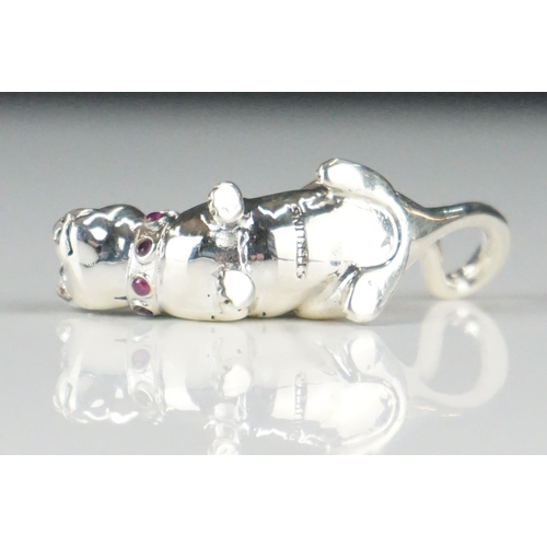 285 - Silver cat figure with ruby collar and emerald eyes