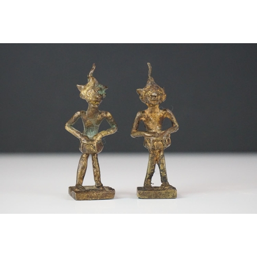 293 - Pair of unusual metal mythical / devil figures, together with a cast metal Indian deity (3)