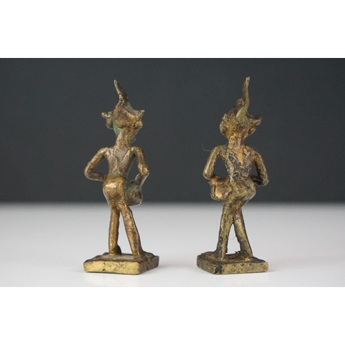 293 - Pair of unusual metal mythical / devil figures, together with a cast metal Indian deity (3)