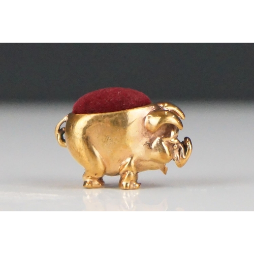 296 - Brass cased pig pincushion