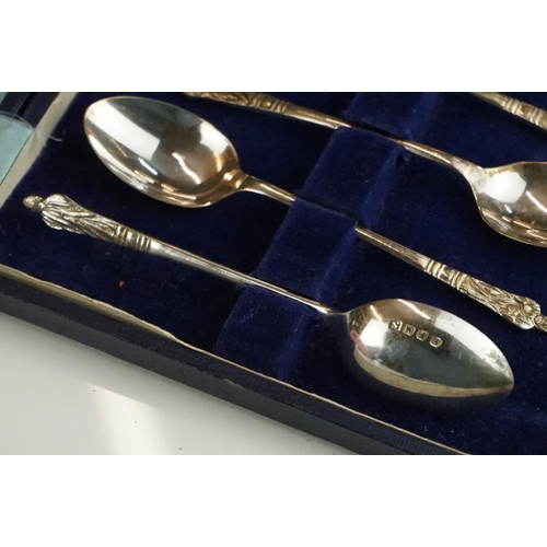 301 - A collection of three cased sets of hallmarked sterling silver teaspoons.