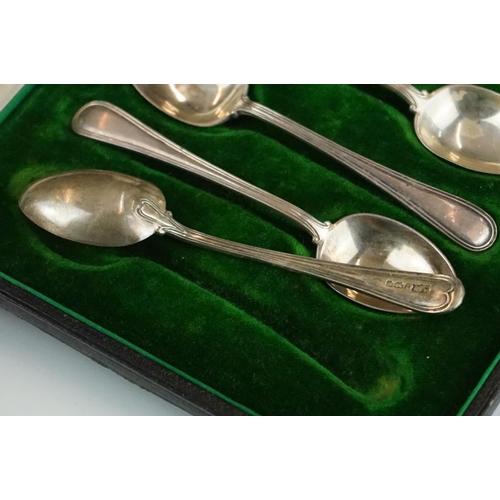 301 - A collection of three cased sets of hallmarked sterling silver teaspoons.