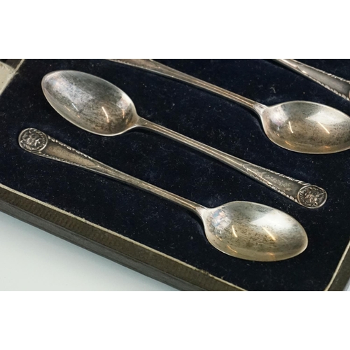 301 - A collection of three cased sets of hallmarked sterling silver teaspoons.