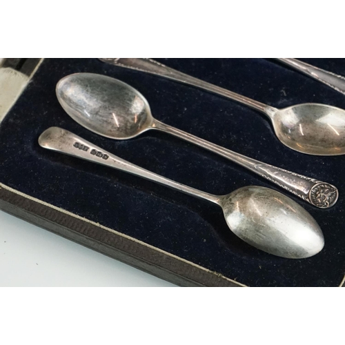 301 - A collection of three cased sets of hallmarked sterling silver teaspoons.