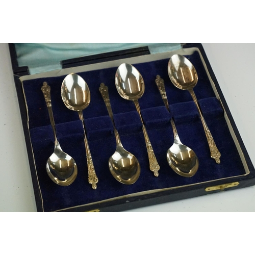 301 - A collection of three cased sets of hallmarked sterling silver teaspoons.