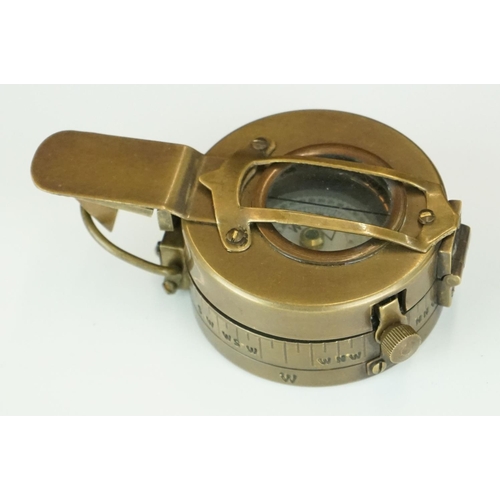 302 - Brass cased military style sundial and compass