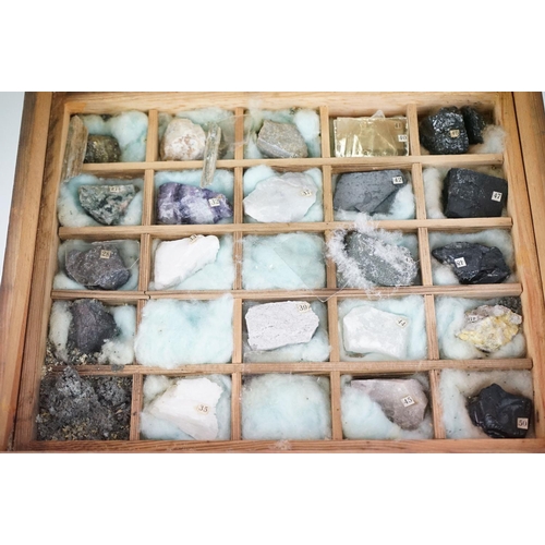 307 - A vintage collection of rocks and minerals contained within a Wooden case.