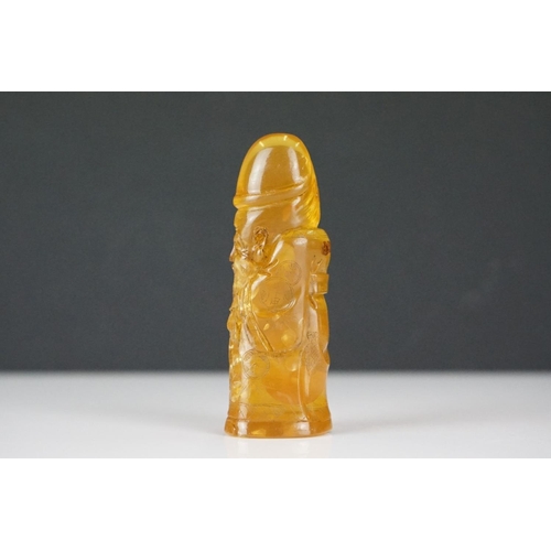 308 - A carved amber Japanese Netsuke pendant in the form of a phallus