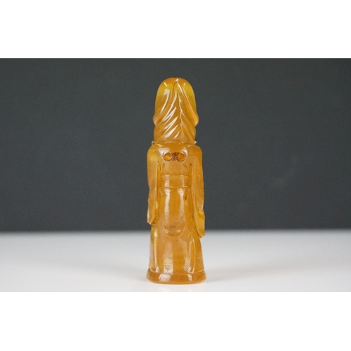 308 - A carved amber Japanese Netsuke pendant in the form of a phallus