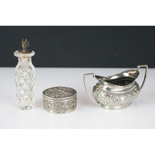 311 - A small collection of hallmarked sterling silver collectables to include candlesticks, napkin ring, ... 