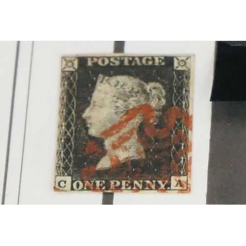 312 - An original Royal Mail penny black stamp mounted within a folder.