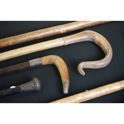 448 - Three Shepherd's Crooks with horn handles, one carved in the form of a Duck, together with African H... 