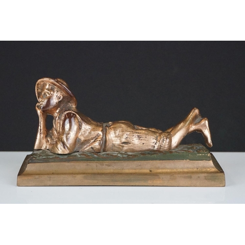 203 - Gilt Bronze Model of a Boy lying on his front, 14cm long