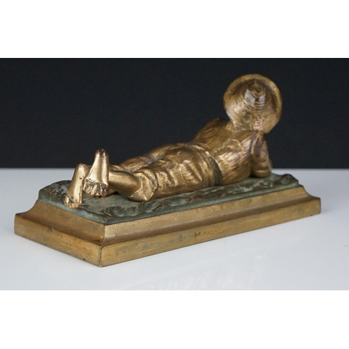 203 - Gilt Bronze Model of a Boy lying on his front, 14cm long