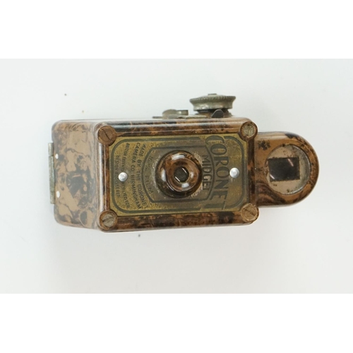 204 - A Vintage Bakelite Coronet Midget camera complete with case.