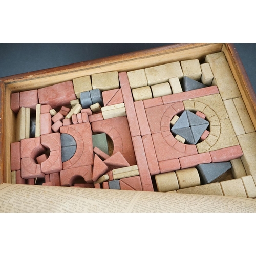 334 - A collection of three antique building block sets, all in original boxes with graphics to lids, incl... 