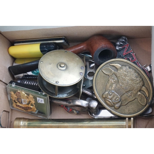 339 - A box of mixed collectables to include car badges, belt buckles, medals, fishing reel and Meccano.