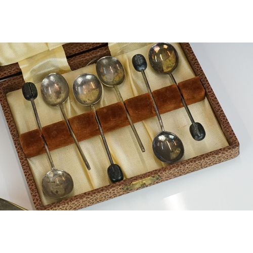 341 - A small collection of silver and silver plated cutlery to include a cased coffee bean spoon set.