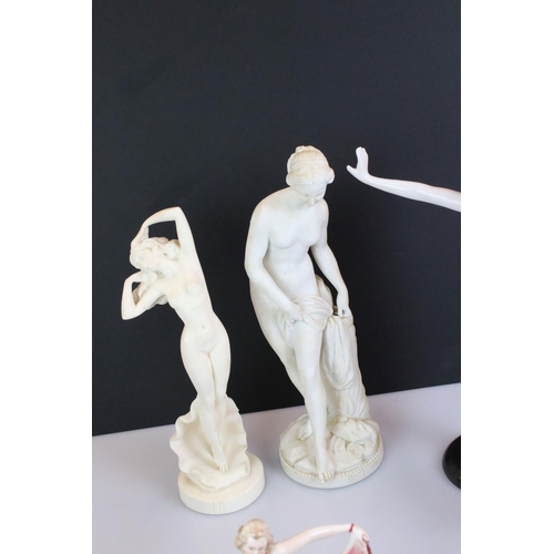 109 - Collection of 12 ceramic and metal figures of nude females, to include Art Deco and classical style ... 