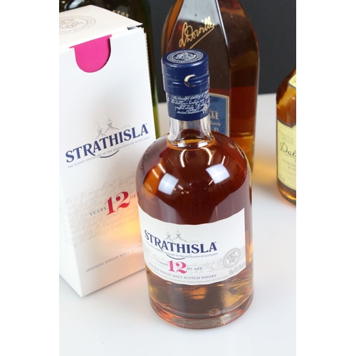 393 - Boxed Strathisla Single Malt Whisky 12 years together with Four Loose Bottles of Single Malt Whisky ... 