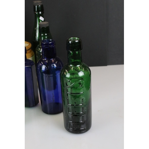 411 - Collection of 19th century and later blue & green glass bottles, to include Ammonia, Joseph Johnson ... 