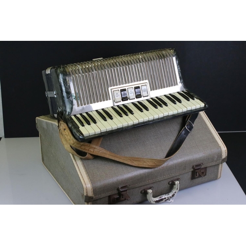 416 - Vintage cased Hohner Carmen III M piano accordion with music & user instructions