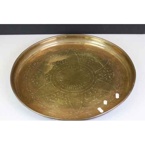 418 - Indian Brass Circular Engraved Tray, 52cm diameter together with Brass Twin Handled Shallow Bowl, 41... 