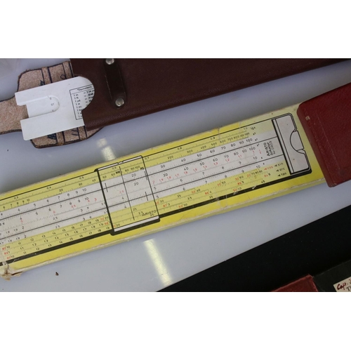 420 - Collection of approx. Twenty One Mid 20th century Cased Slide Rules including Aristo, P.I.C,