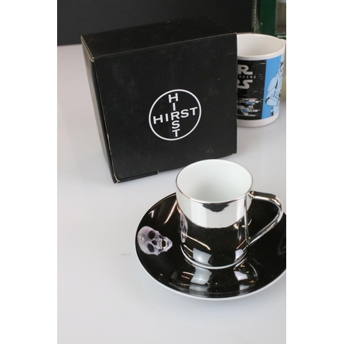 99 - Boxed Damien Hirst Anamorphic Cup and Saucer together with 4 Damien Hirst ltd edn Beck's drinking gl... 