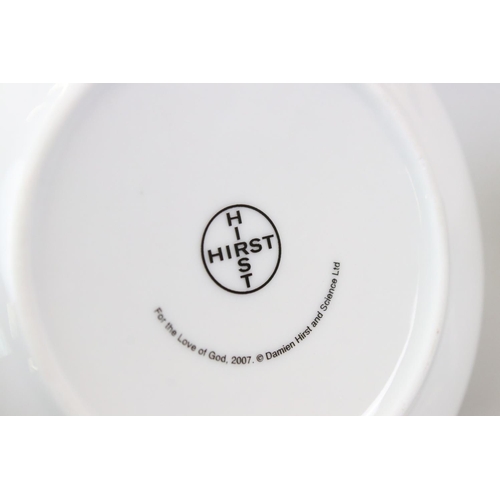 99 - Boxed Damien Hirst Anamorphic Cup and Saucer together with 4 Damien Hirst ltd edn Beck's drinking gl... 