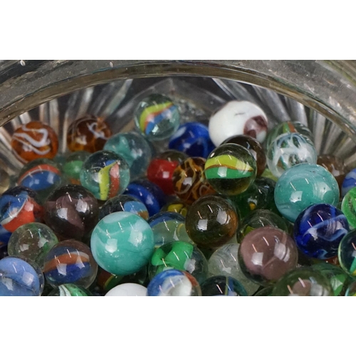 371 - A large collection of mainly contemporary marbles contained within a glass jar.