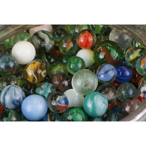 371 - A large collection of mainly contemporary marbles contained within a glass jar.