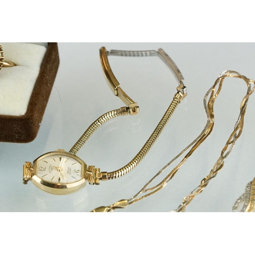 221A - A small collection of gold jewellery to include a 14k gold ring and 9ct gold necklaces.